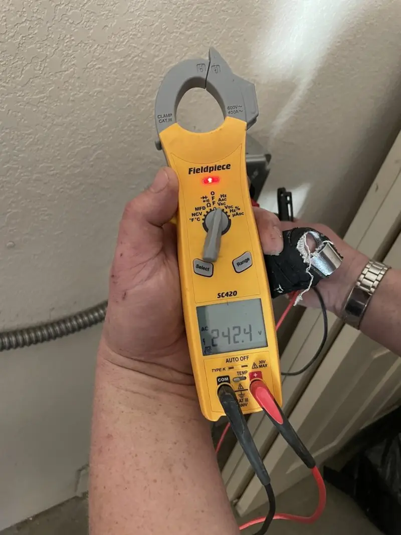 Voltage testing with clamp meter during Generator Installation in Latrobe